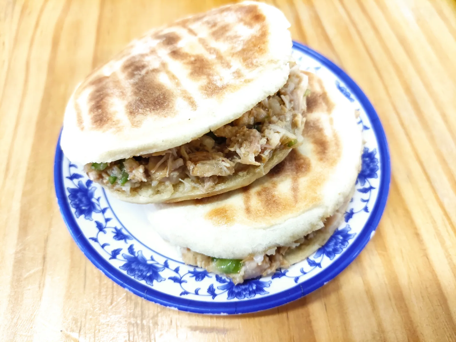 Roujiamo flatbread filled with chopped braised meat